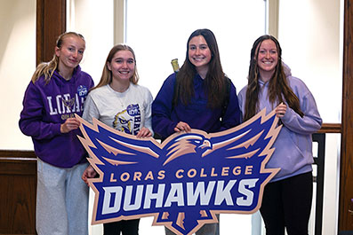 Photo of students holding a sign. Link to Gifts by Will. will.jpg